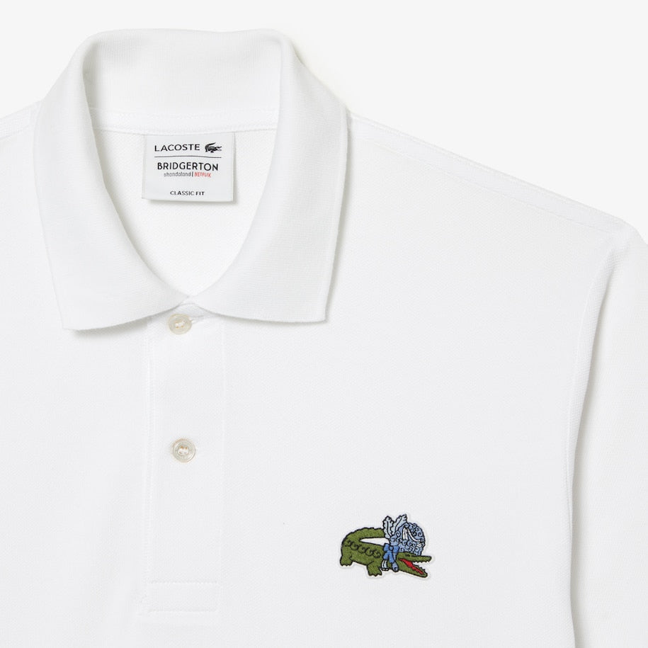Polo in Cotone con Logo Lacoste Netflix / Bianco - Ideal Moda